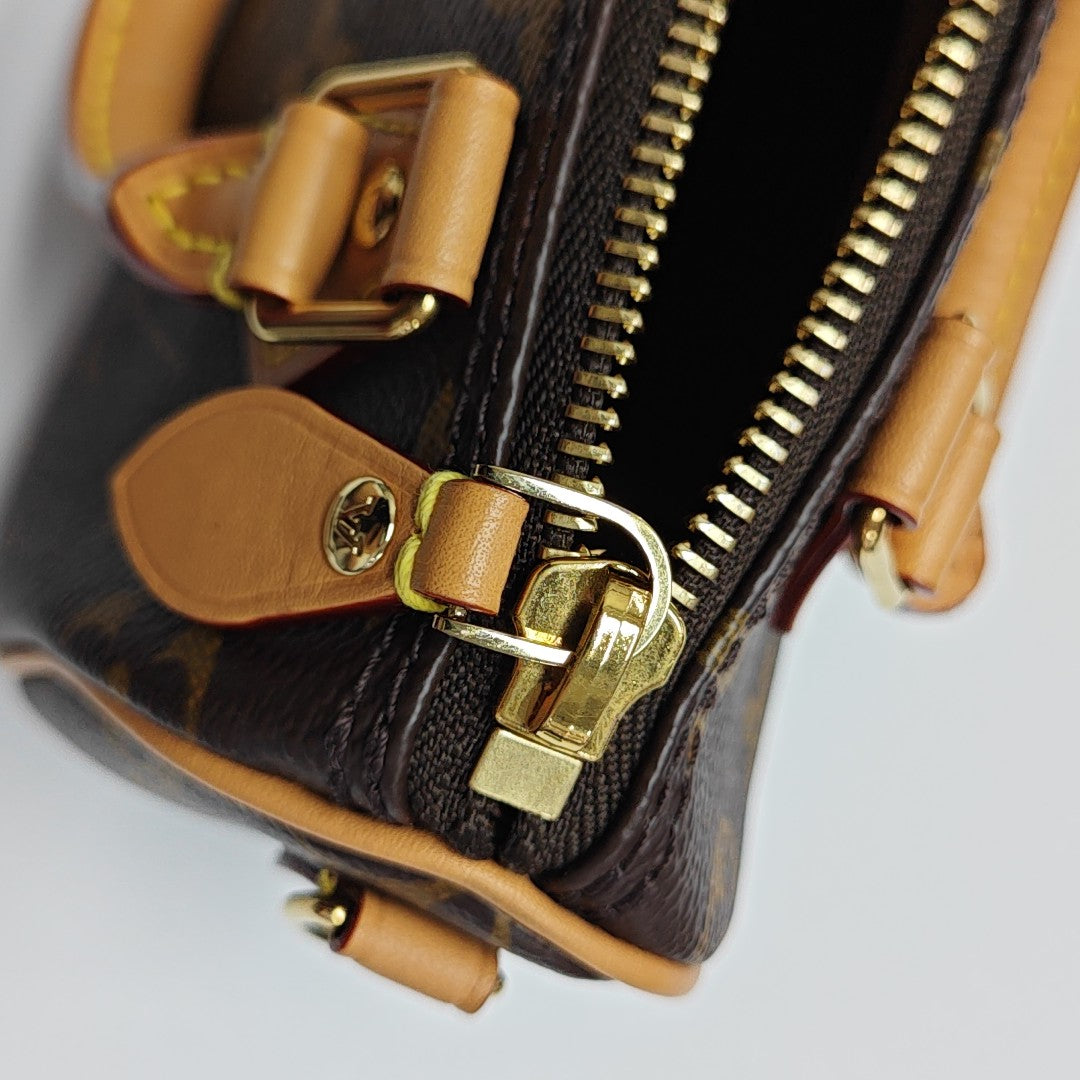 Authenticated pre-owned  SPEEDY Nano Monogram Coated Canvas Brown - Shoulder Bag at Looply