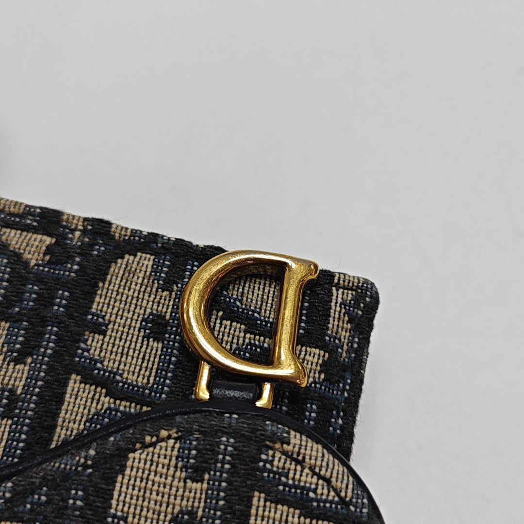 Authenticated pre-owned  Saddle Monogram Fabric Blue Card Holder - Card Holder at Looply