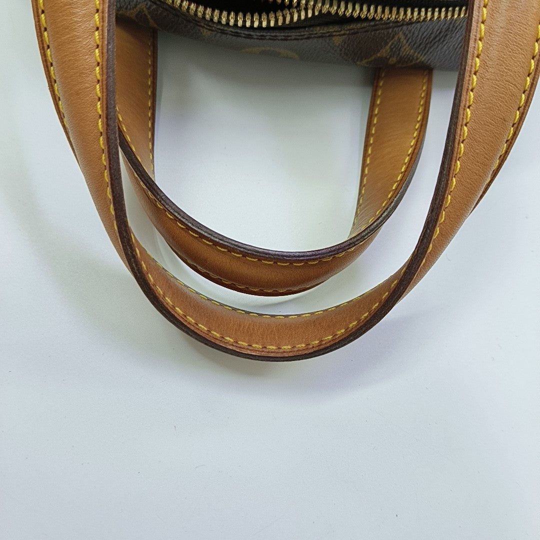EXCENTRI-CITE Monogram Coated Canvas Brown