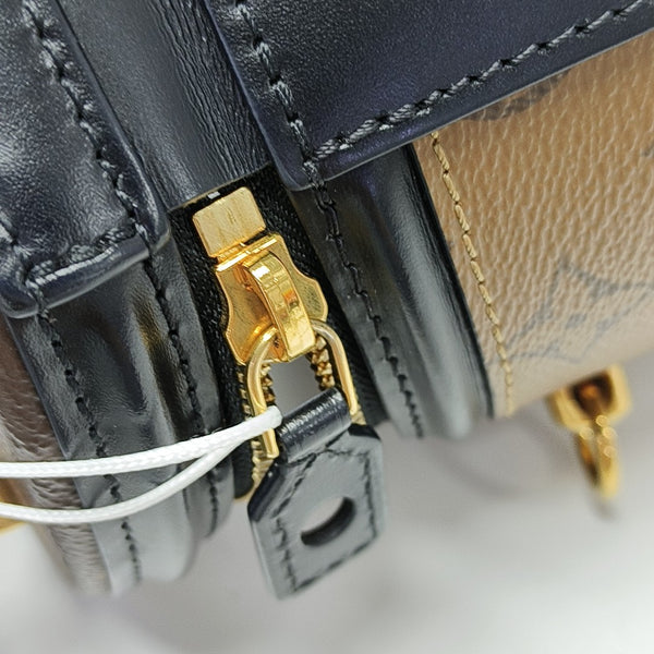 CANNES PM Monogram Coated Canvas Brown