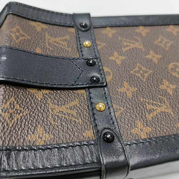 TRUNK Monogram Coated Canvas Brown