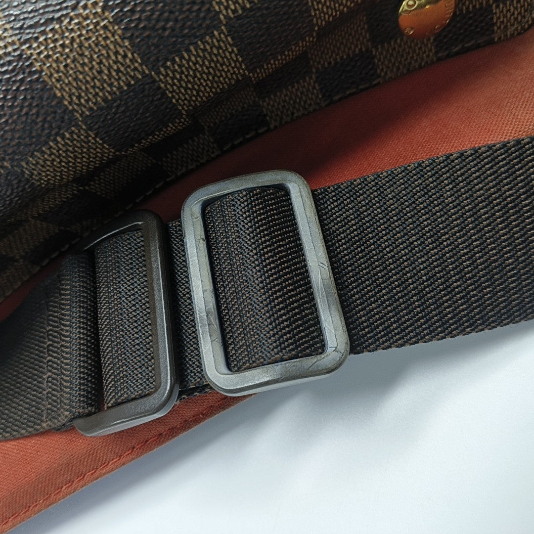 DISTRICT MM Damier Ebene Coated Canvas Brown