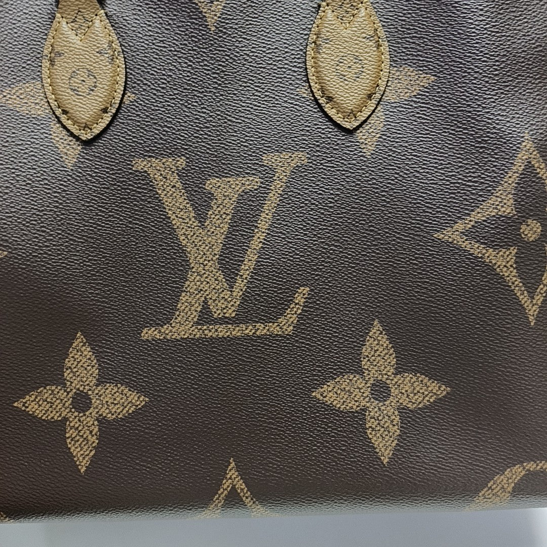 ONTHEGO MM Monogram Coated Canvas Brown