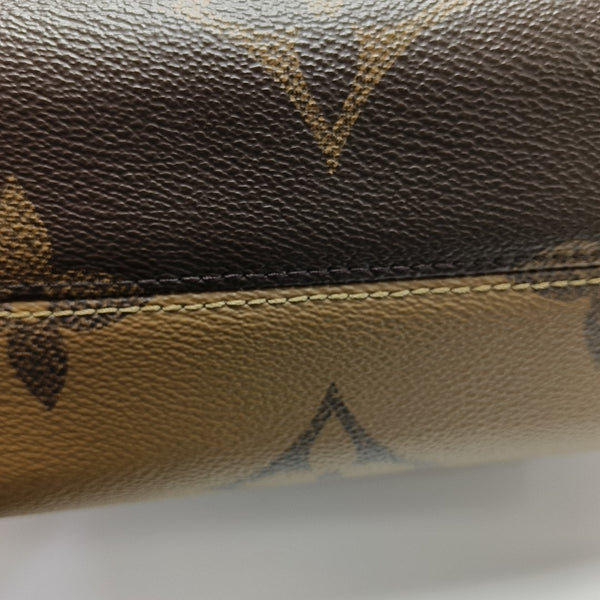 ONTHEGO PM Monogram Coated Canvas Brown