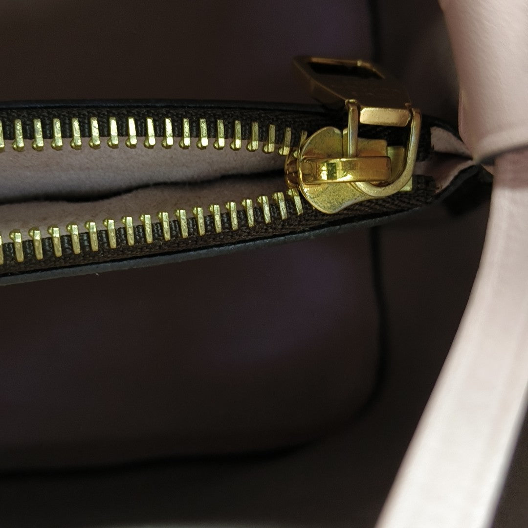 NÉONOÉ MM Monogram Coated Canvas Brown