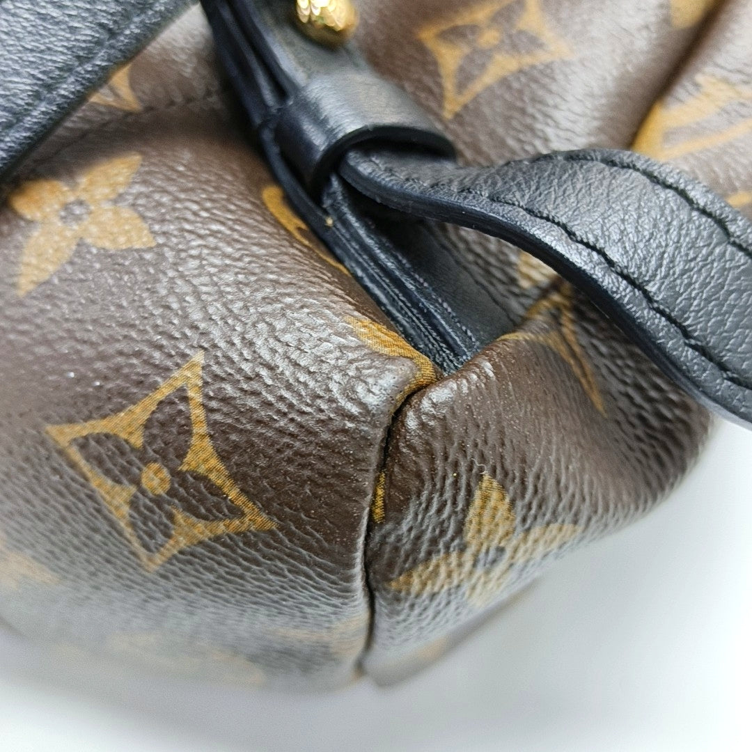 Authenticated pre-owned  PALM SPRINGS PM Monogram Coated Canvas Brown - Backpack at Looply