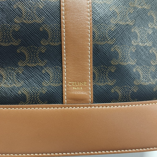 Authenticated pre-owned  TRIOMPHE CANVAS Medium Coated Canvas Brown - Bucket Bag at Looply
