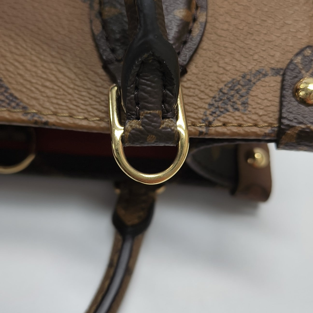 ONTHEGO BB Monogram Coated Canvas Brown
