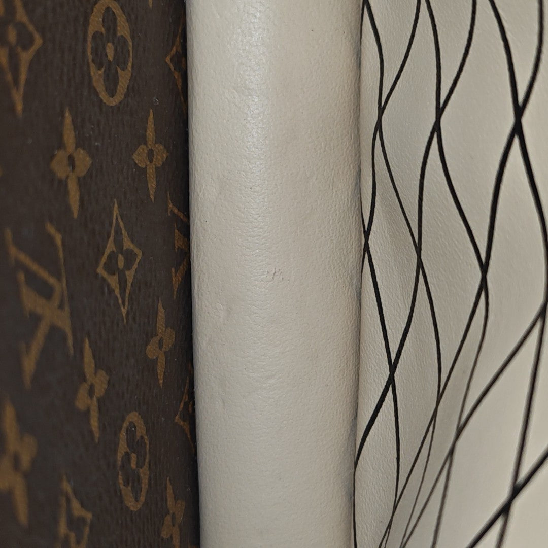 TRUNK Monogram Coated Canvas Brown