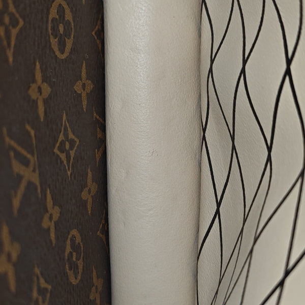TRUNK Monogram Coated Canvas Brown