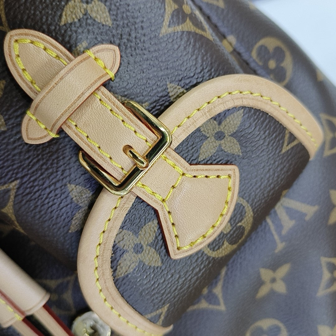 EXCURSION PM Monogram Coated Canvas Brown