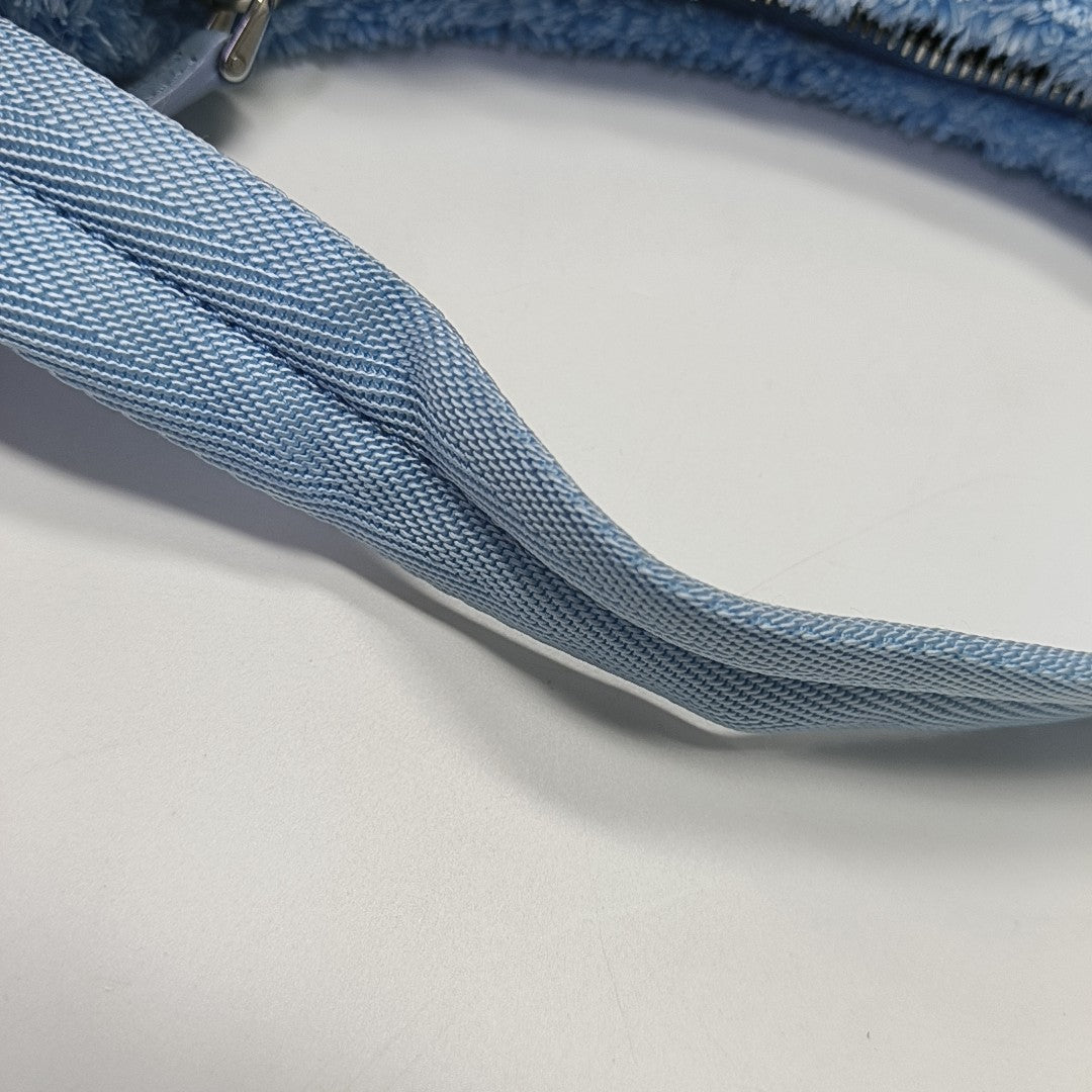 Authenticated pre-owned  Re-Edition2000 Mini Terry Cloth Blue - Top Handle Bag at Looply