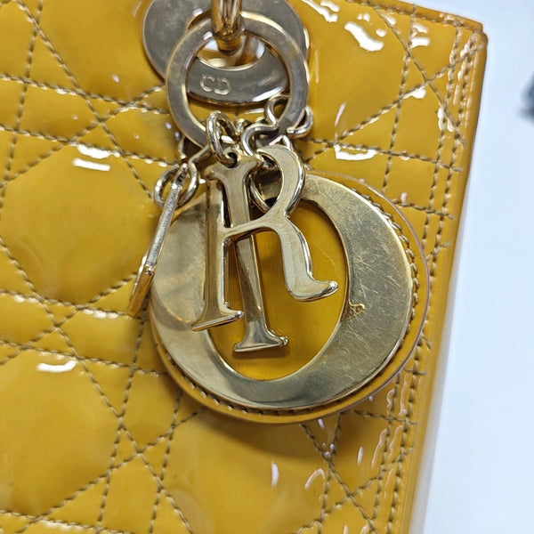 Authenticated pre-owned  Lady Dior Quilted Patent Leather Yellow - Tote Bag at Looply