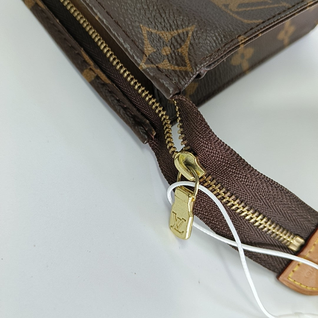 TOILET POCKET 19 Monogram Coated Canvas Brown