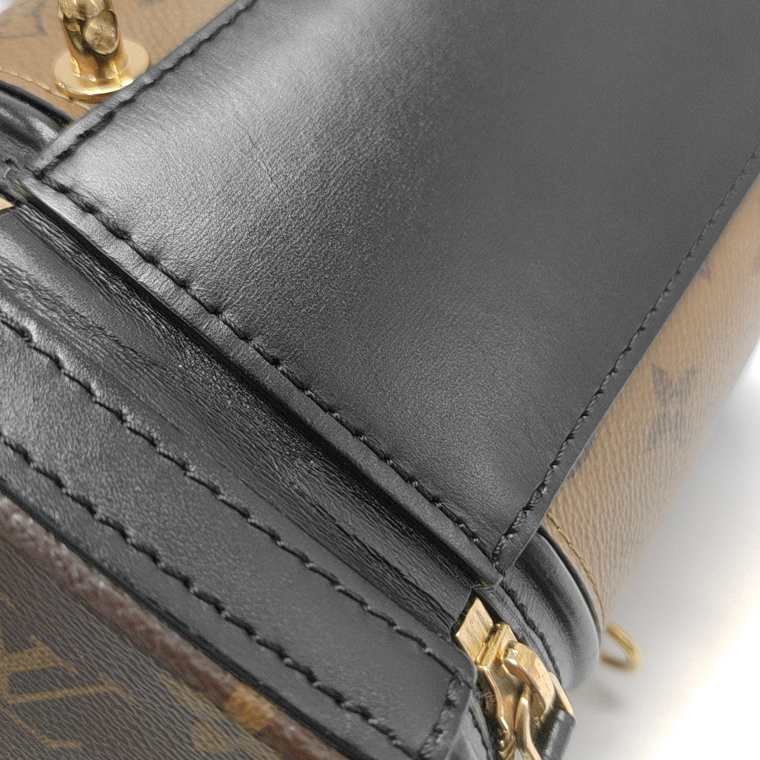 CANNES PM Monogram Coated Canvas Brown