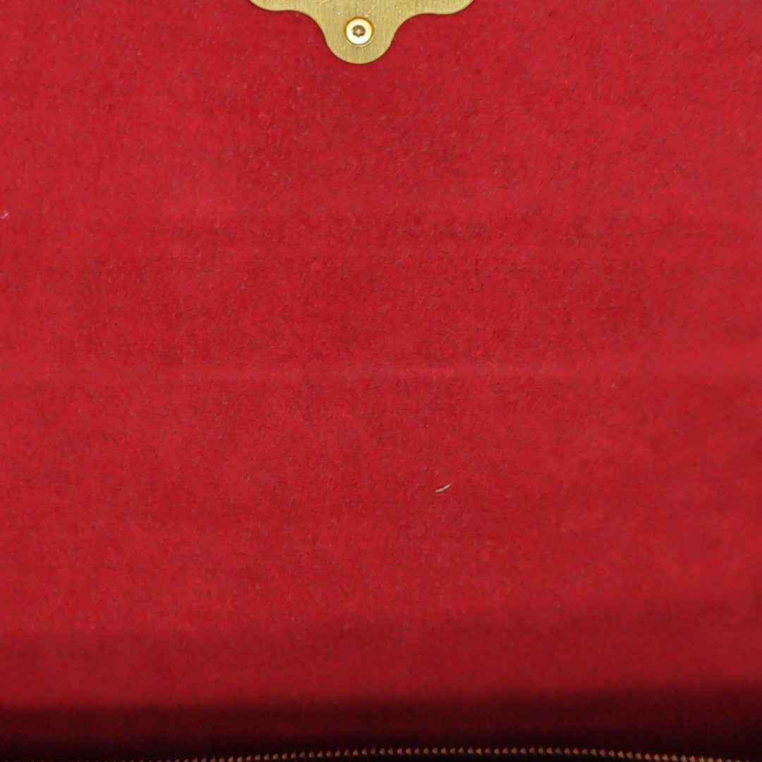 VICTOIRE Monogram Coated Canvas Brown