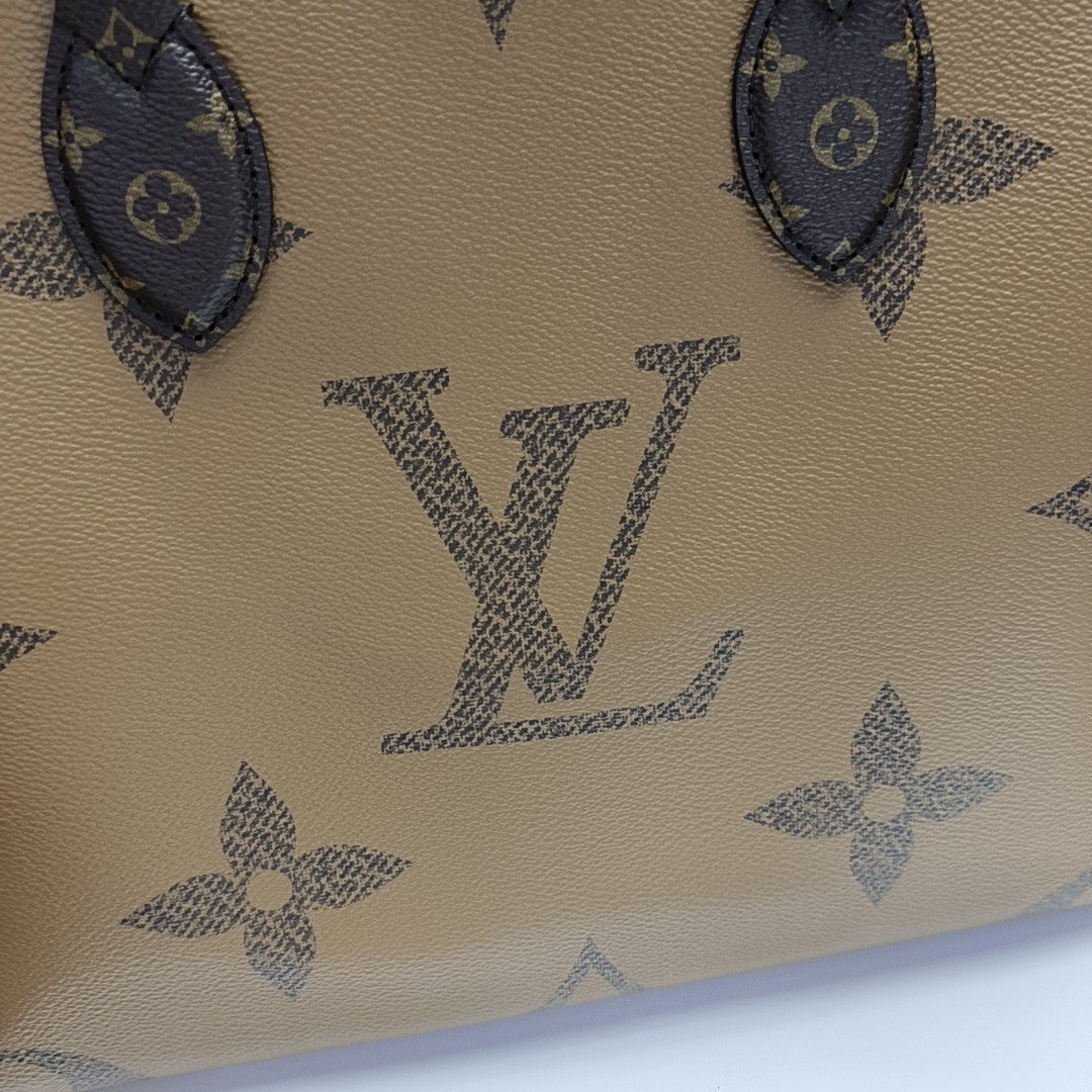 ONTHEGO MM Monogram Coated Canvas Brown