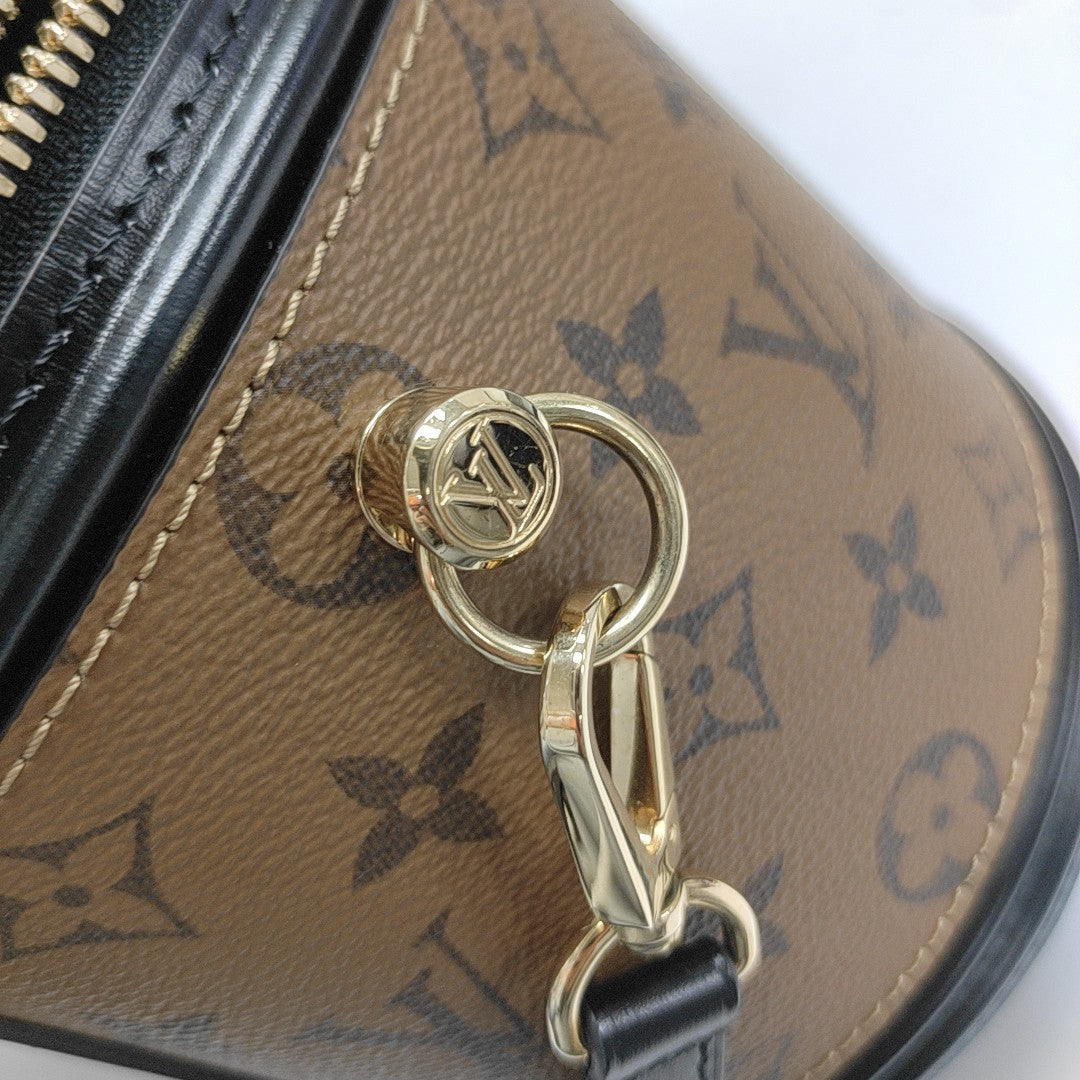 CANNES PM Monogram Coated Canvas Brown