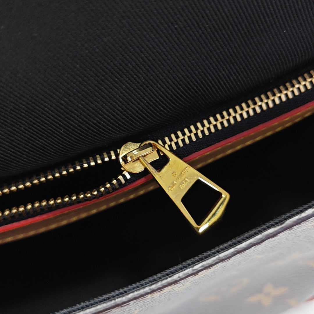 DIANE Monogram Coated Canvas Brown