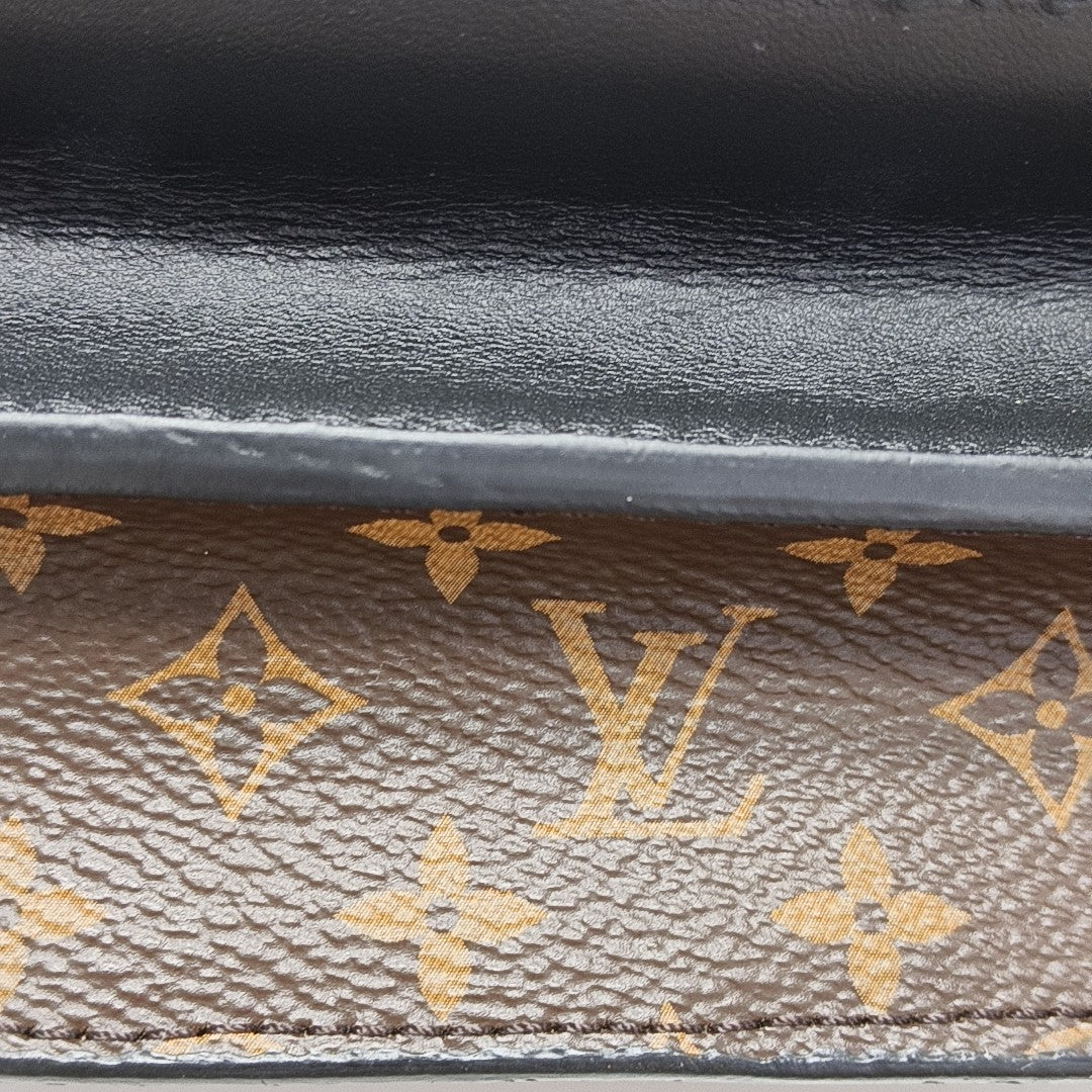 TRUNK Monogram Coated Canvas Brown