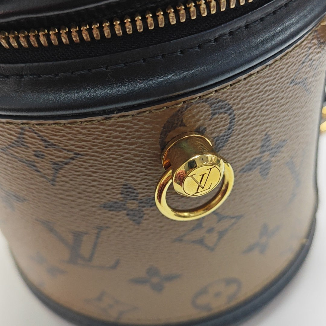 CANNES PM Monogram Coated Canvas Brown