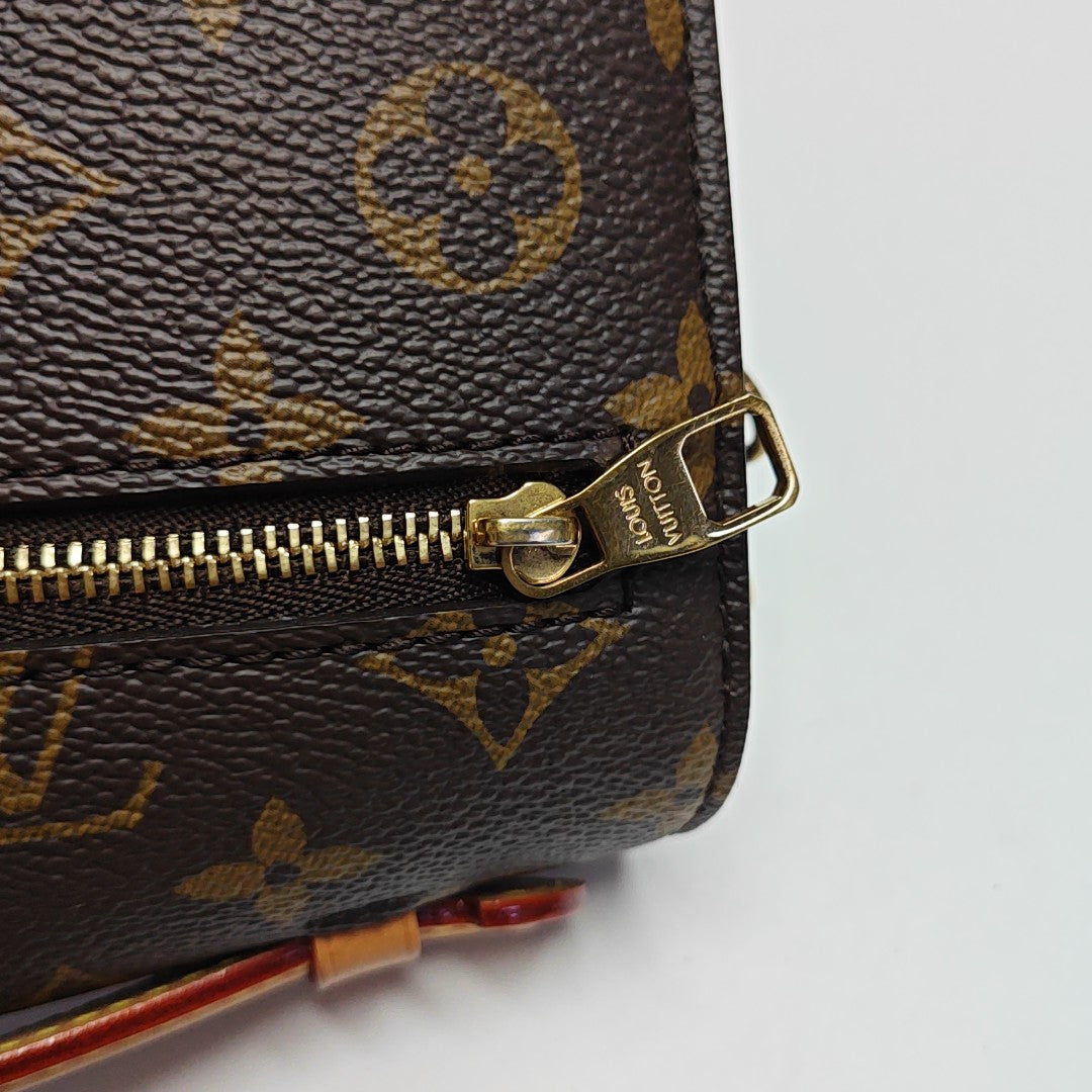 MÉTIS EAST WEST Monogram Coated Canvas Brown