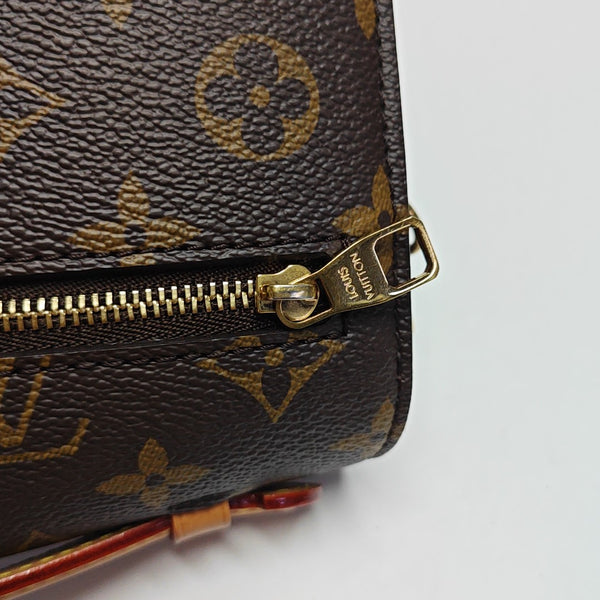 MÉTIS EAST WEST Monogram Coated Canvas Brown
