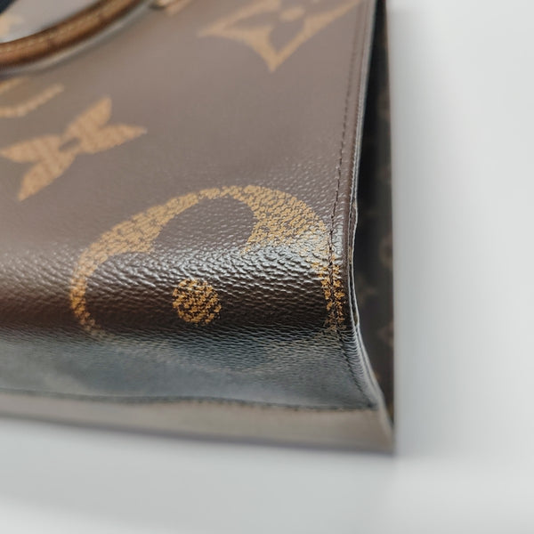 ONTHEGO MM Monogram Coated Canvas Brown