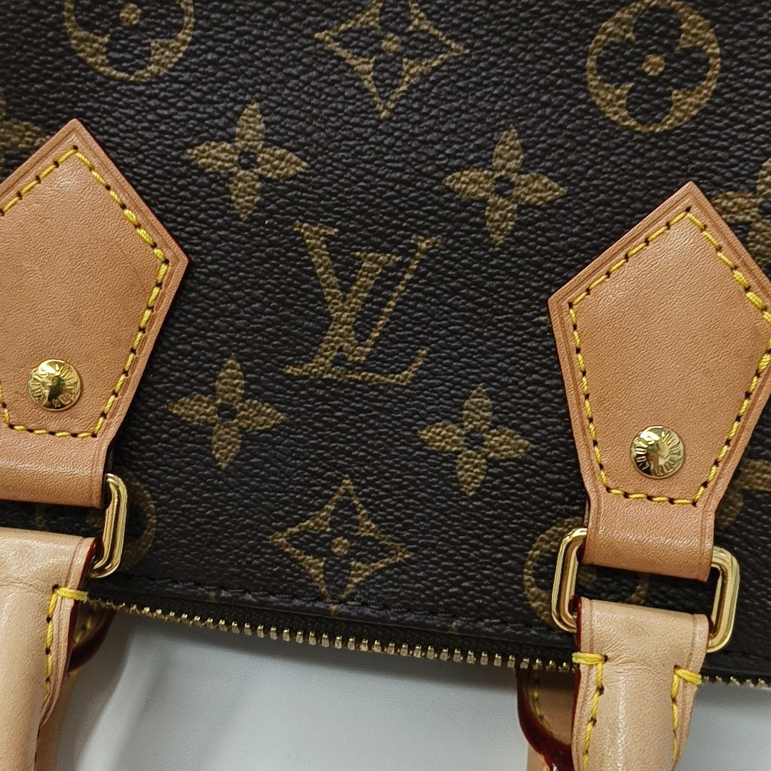 SPEEDY 20 Monogram Coated Canvas Brown
