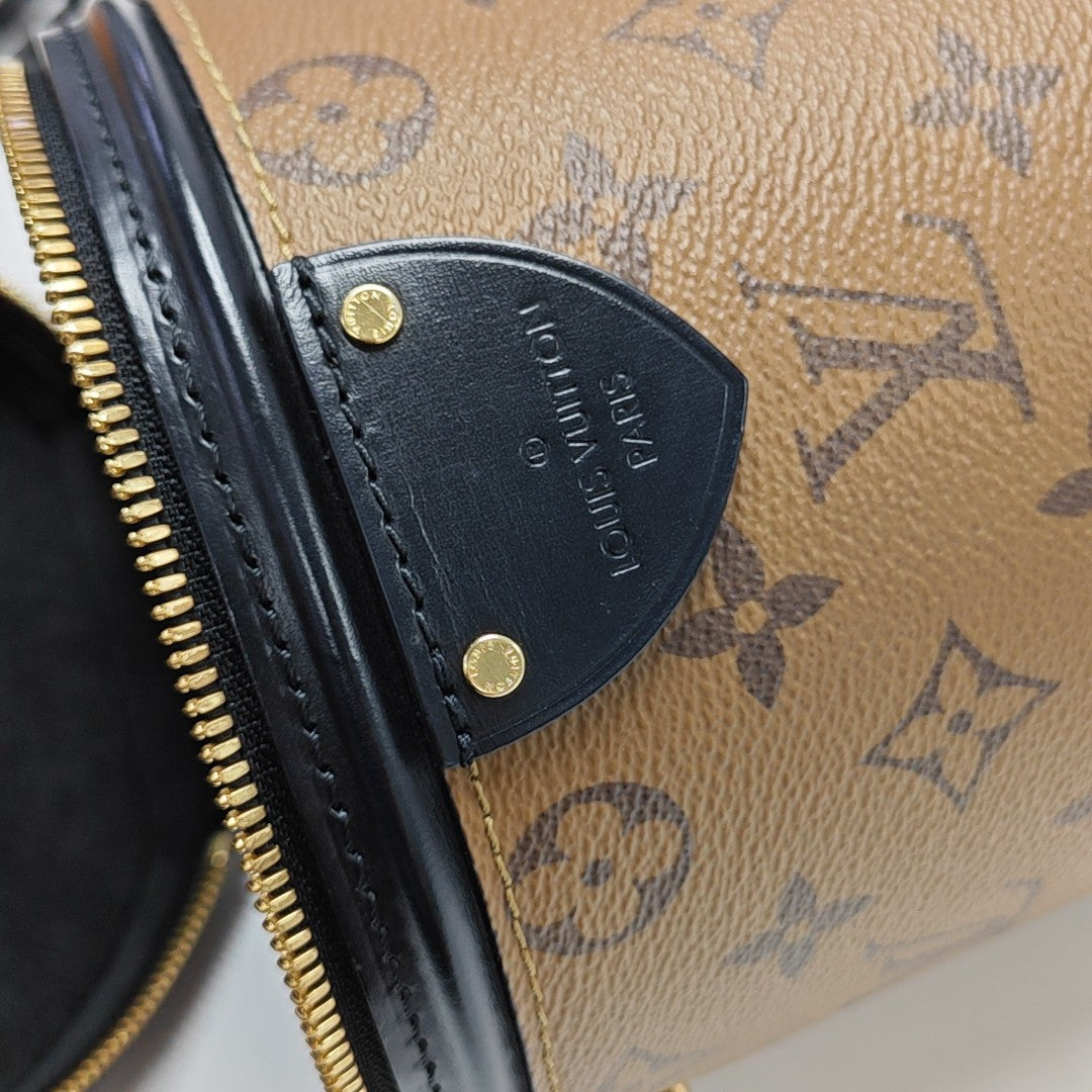 CANNES PM Monogram Coated Canvas Brown
