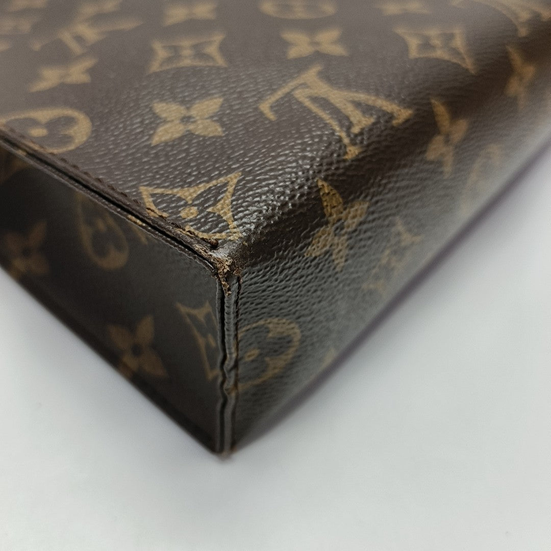 TOILET POCKET 26 Monogram Coated Canvas Brown