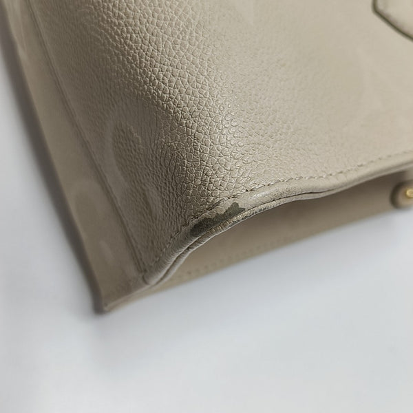 ONTHEGO PM Monogram Calfskin Beige