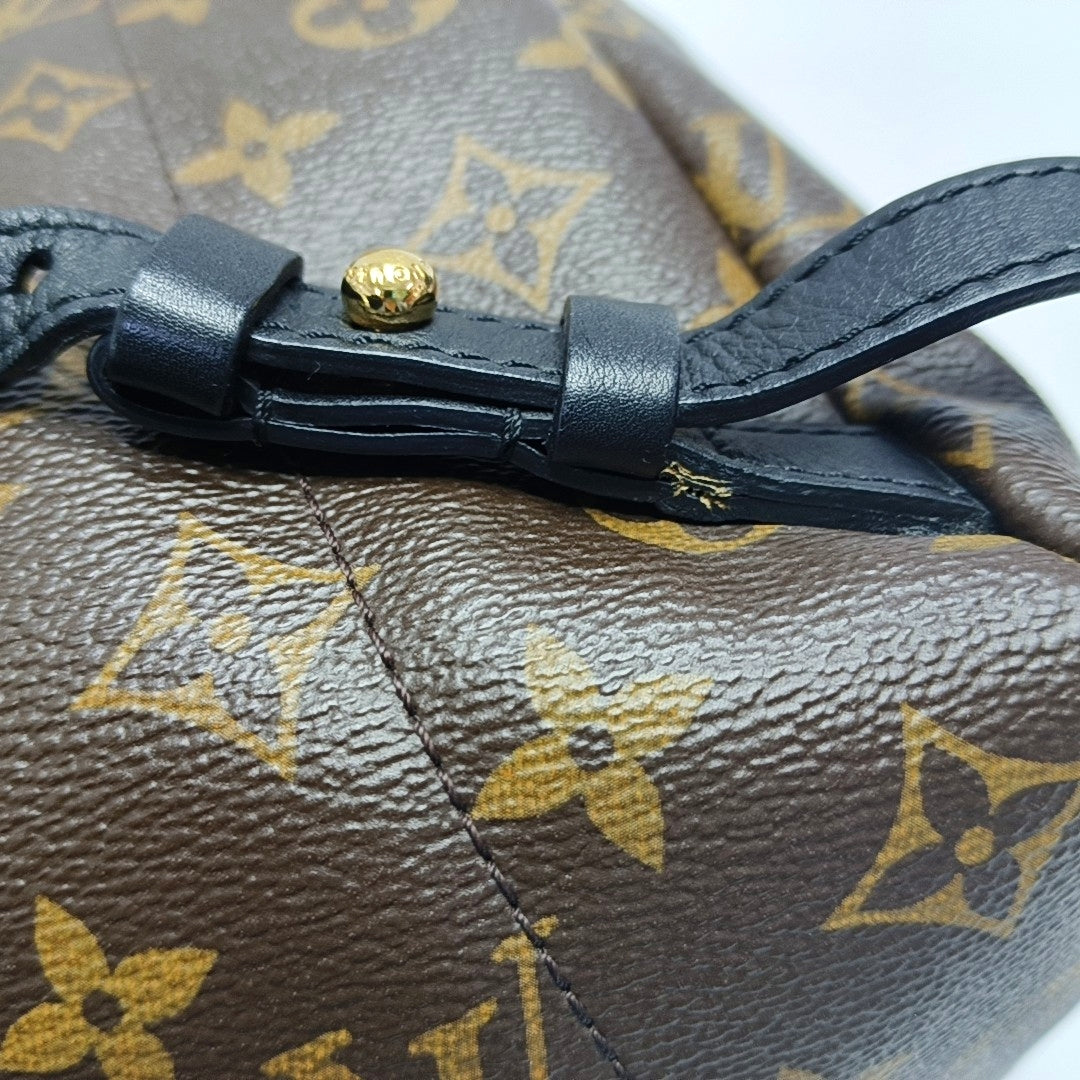 Authenticated pre-owned  PALM SPRINGS PM Monogram Coated Canvas Brown - Backpack at Looply