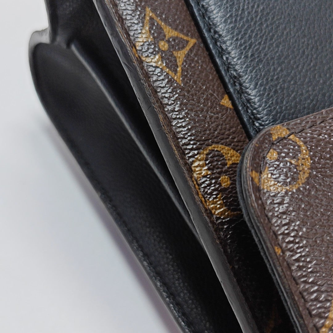 VICTOIRE Monogram Coated Canvas Brown