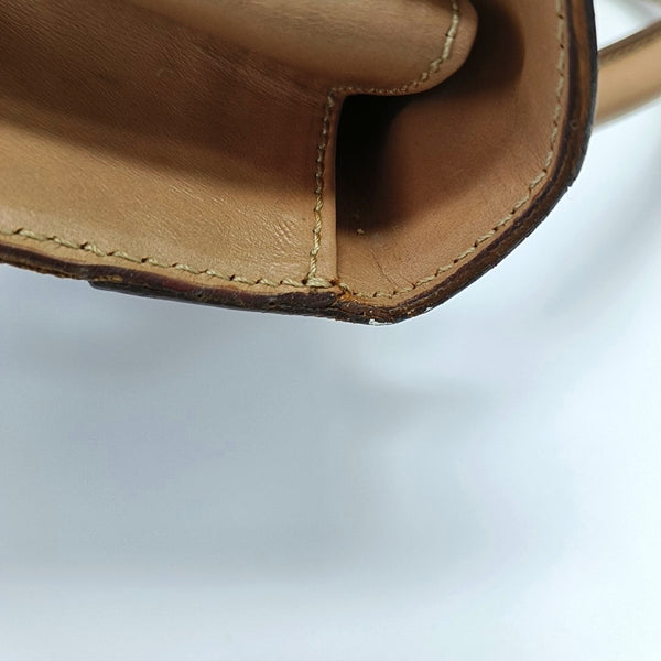 Authenticated pre-owned  MACADAM BLASON TRIOMPHE Coated Canvas Brown - Top Handle Bag at Looply
