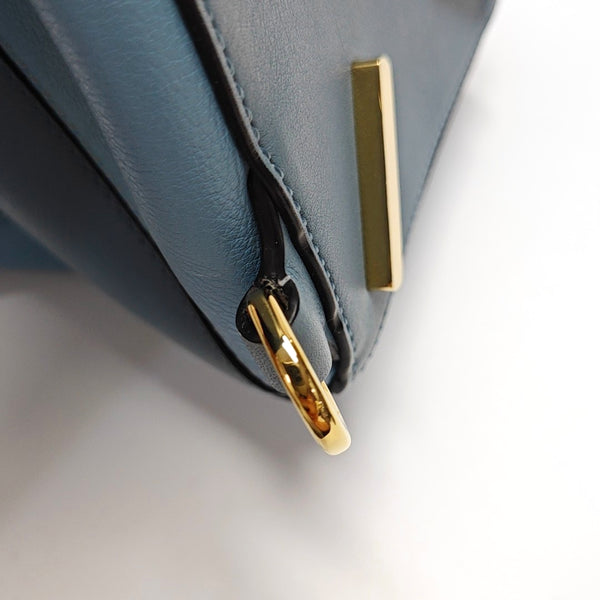 Authenticated pre-owned  Puzzle Medium Calfskin Blue - Shoulder Bag at Looply