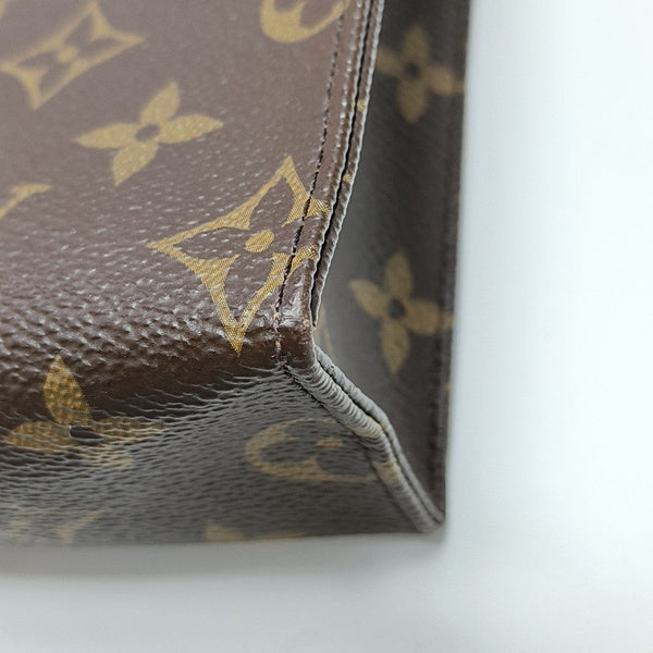 TOILET POCKET 26 Monogram Coated Canvas Brown