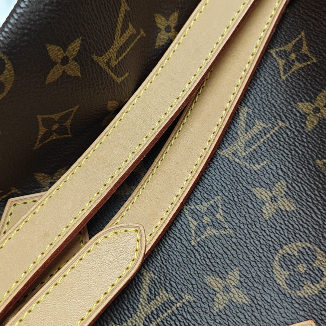 SPEEDY 25 Monogram Coated Canvas Brown