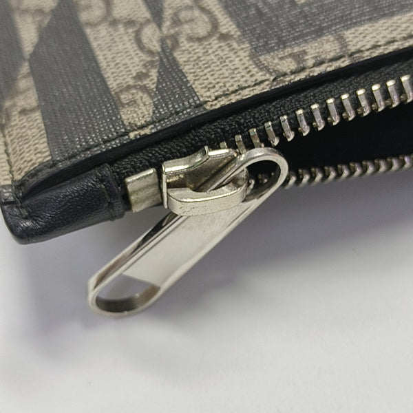 Monogram Coated Canvas Clutch Multicolor