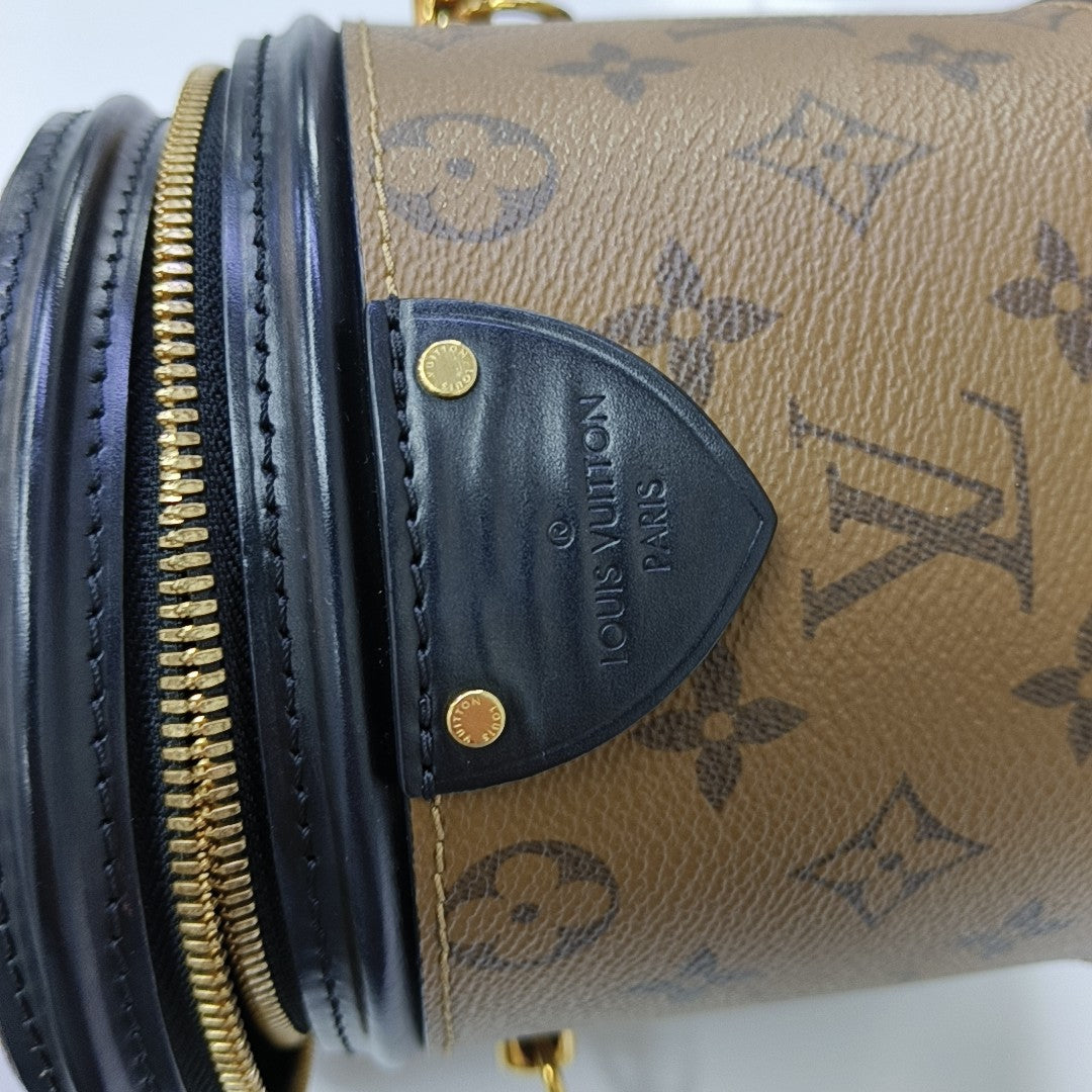 CANNES PM Monogram Coated Canvas Brown