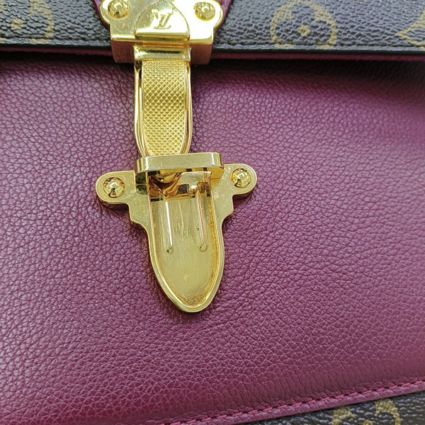 VICTOIRE Monogram Coated Canvas Brown