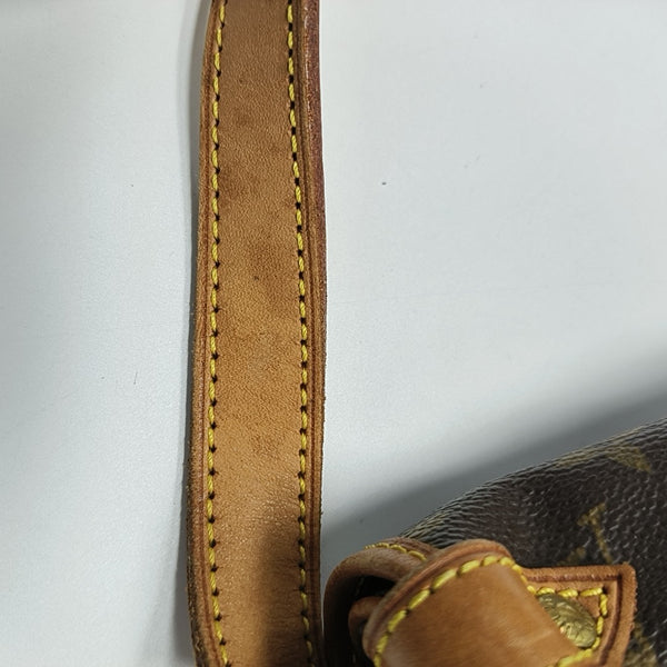SAUMUR Monogram Coated Canvas Brown