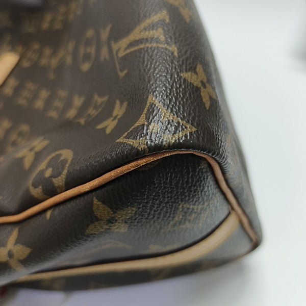 SPEEDY 25 Monogram Coated Canvas Brown