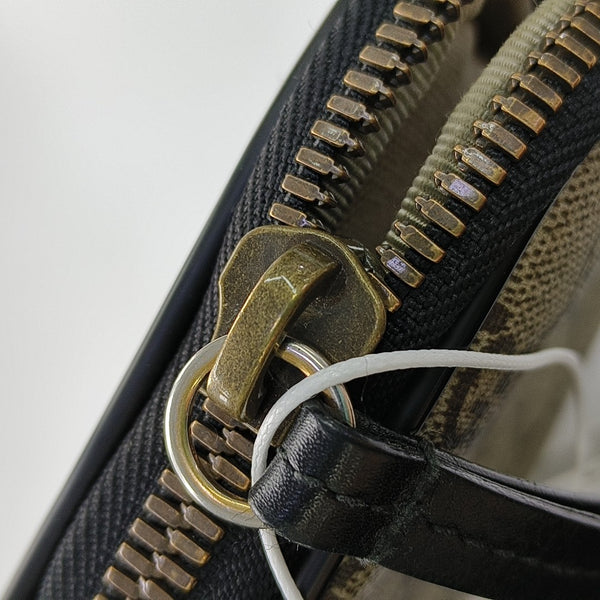 Authenticated pre-owned  GG Marmont Monogram Coated Canvas Beige - Clutch at Looply