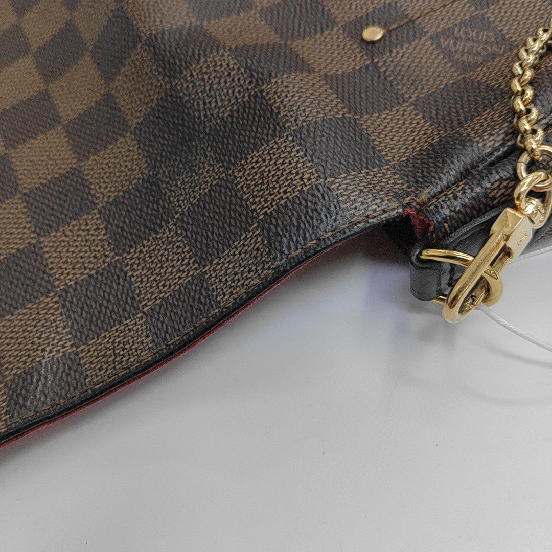FAVORITE PM Damier Ebene Coated Canvas Brown