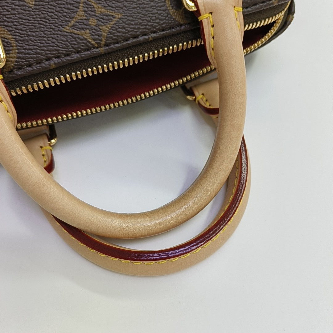 SPEEDY 20 Monogram Coated Canvas Brown
