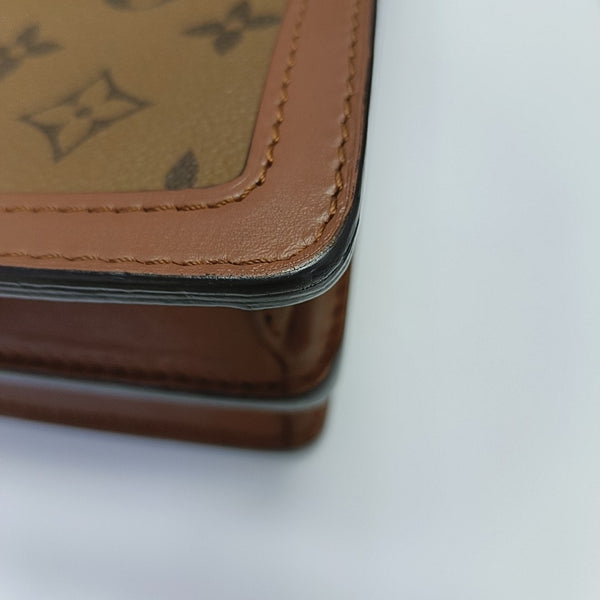 DAUPHINE MM Monogram Coated Canvas Brown