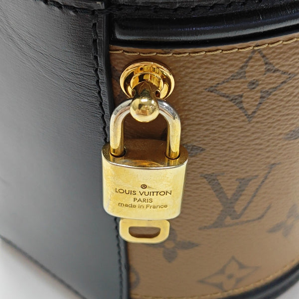 CANNES PM Monogram Coated Canvas Brown