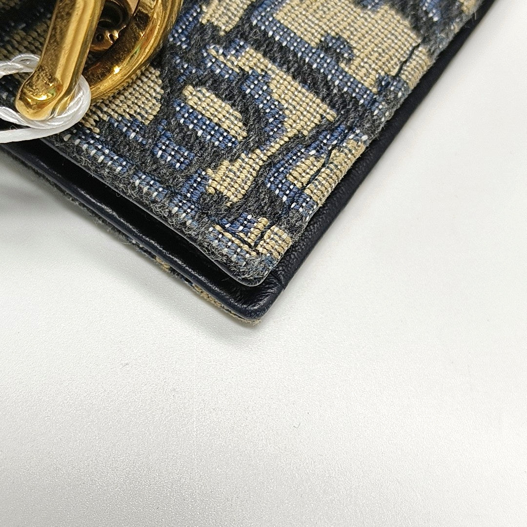 Authenticated pre-owned  Saddle Oblique Canvas Blue Wallet - Wallet at Looply