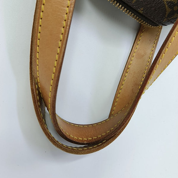 EXCURSION Monogram Coated Canvas Brown
